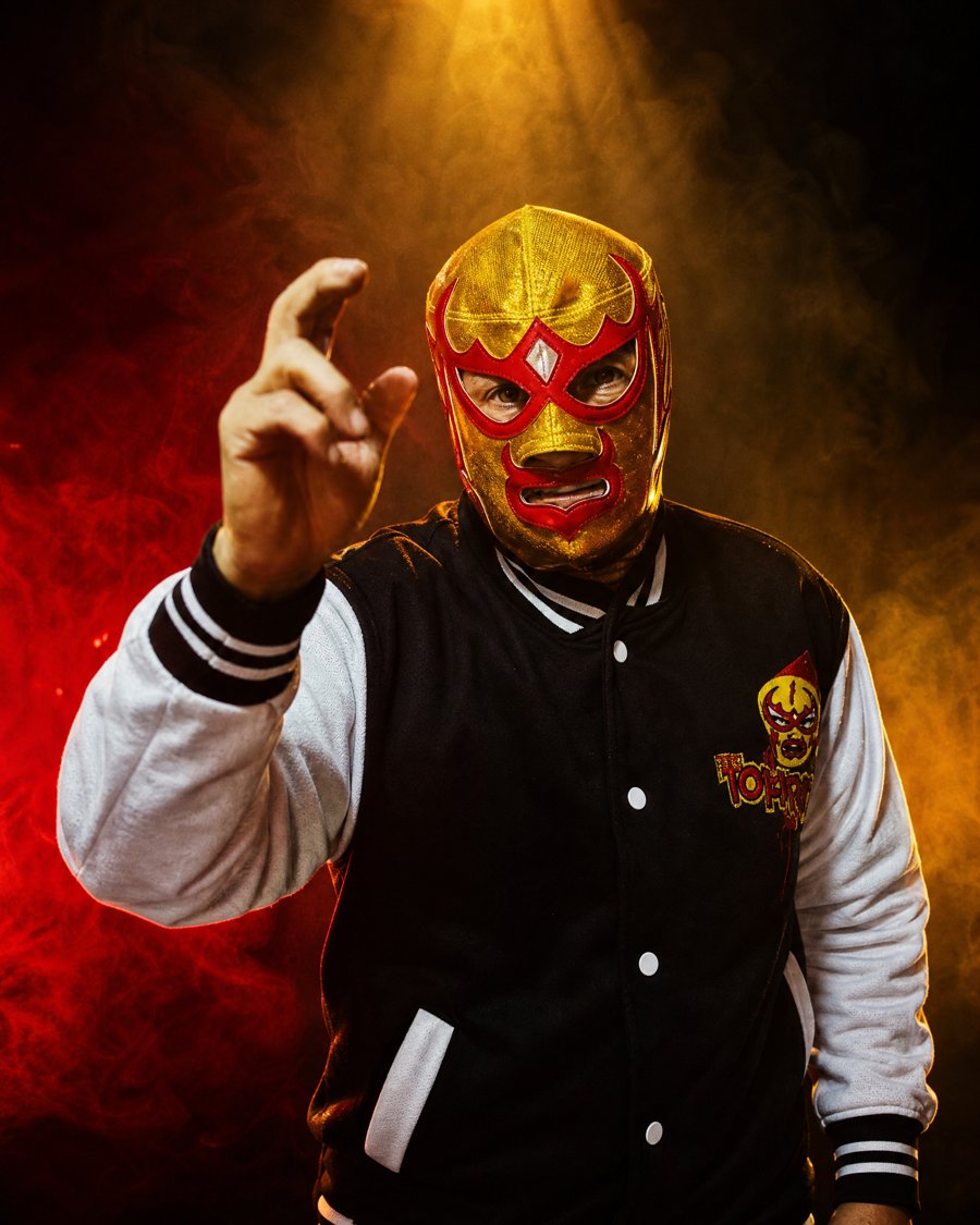 The Original Nacho Libre luchador in gold and red mask performing at Lucha Libre Fan Expo Toronto - Get Married or Renew Your Vows 2026